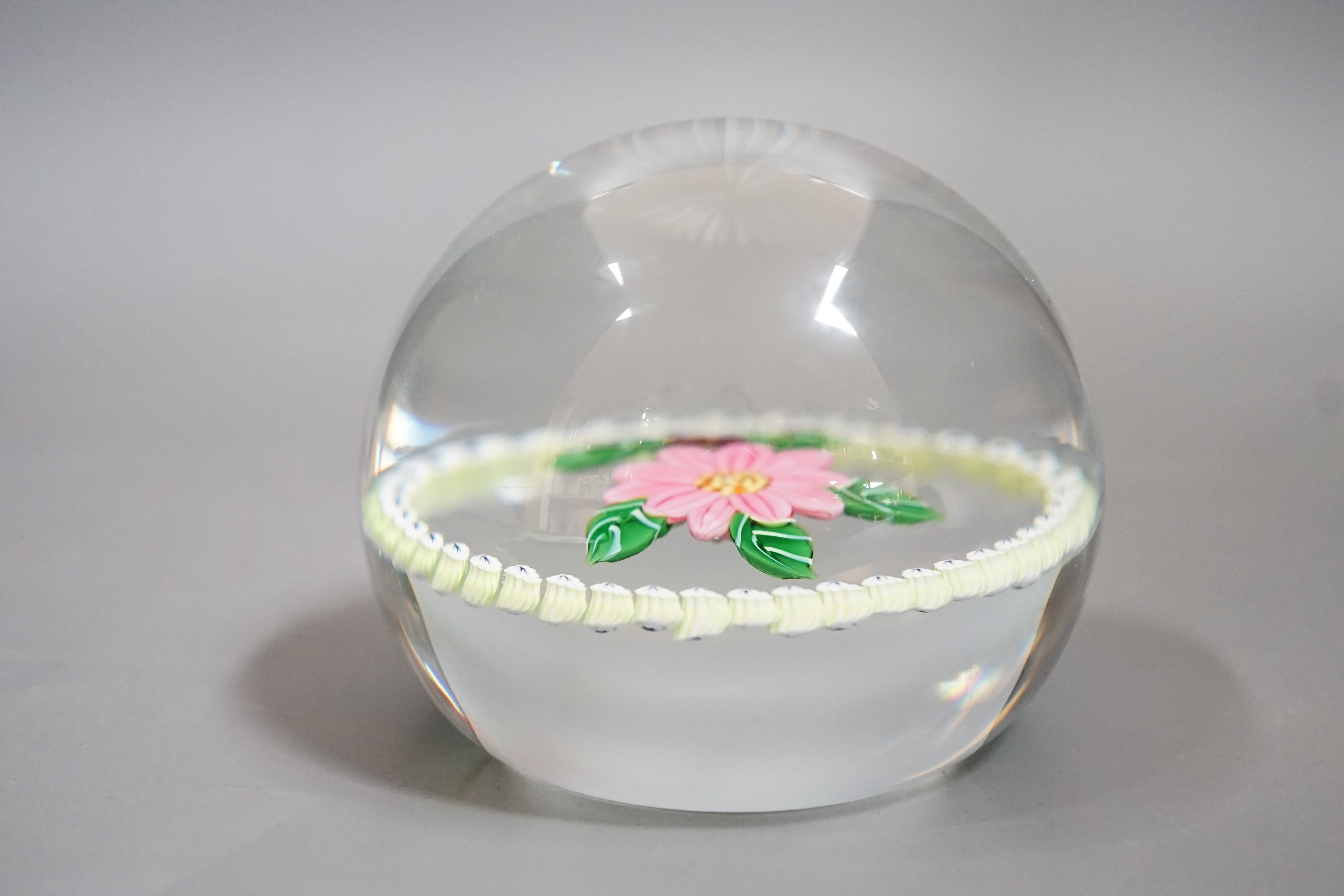 A Caithness pink camelia glass paperweight, no.94/250